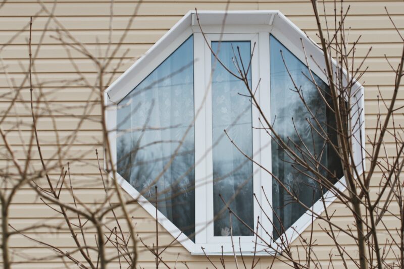 specialty shaped window installed in home
