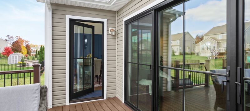 a french inswing door leading to a home's patio