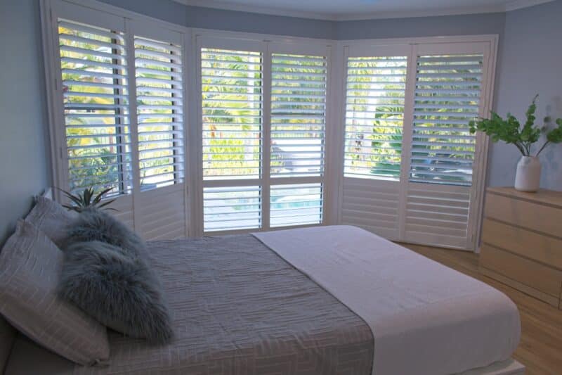 interior bedroom with large bay window