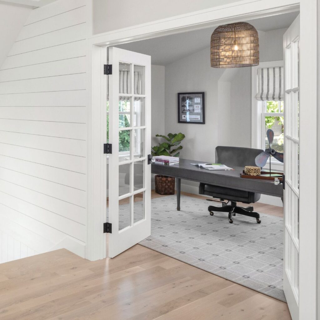 white interior doors opening up towards a home office
